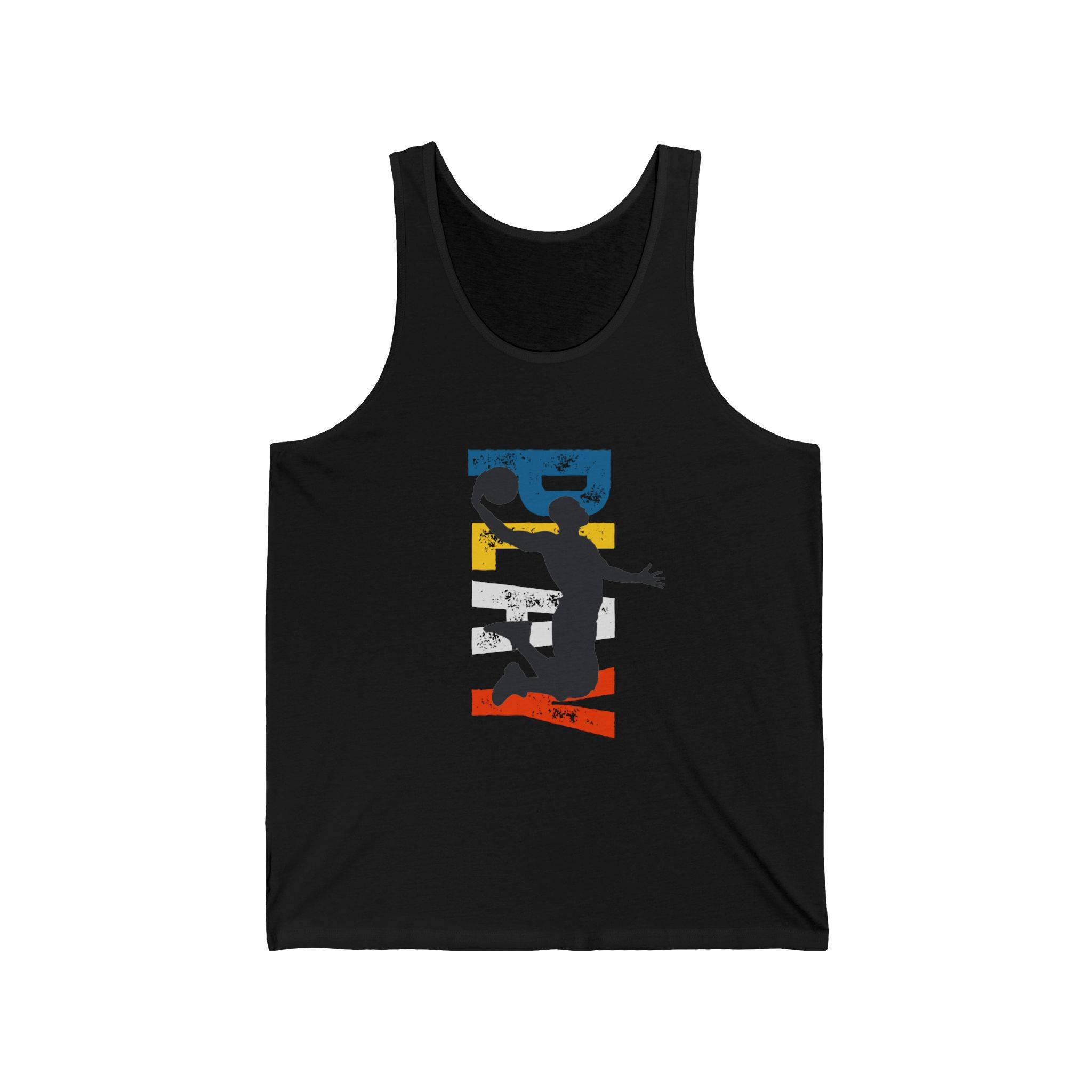 A black tank top featuring a dynamic silhouette of a basketball player jumping against a backdrop of colorful stripes in blue, yellow, black, and orange.